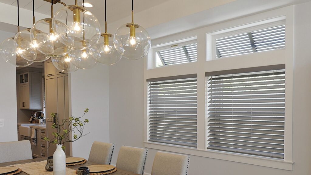Norman SmartPrivacy® Faux Wood Blinds in the dining area