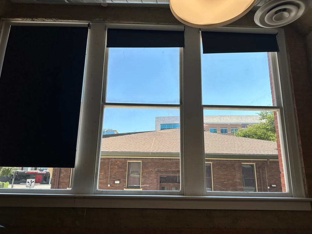manual roller shades in an office